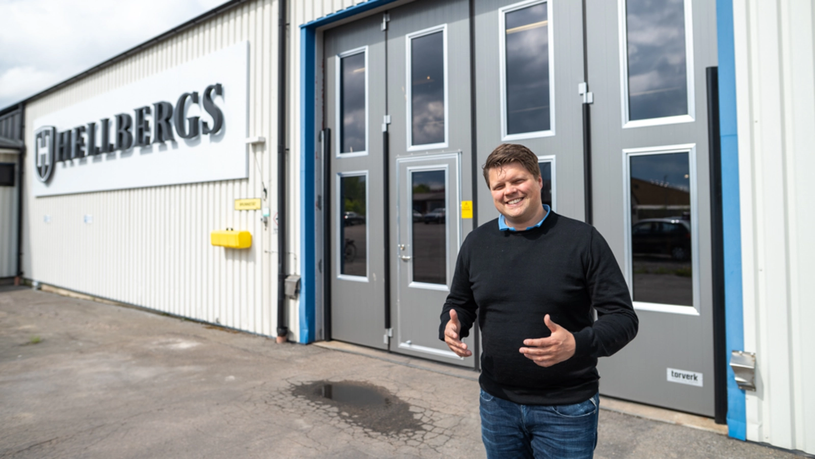 Hellbergs Security Doors owner, Sebastian Hellberg, in front of one of the new folding doors from Torverk