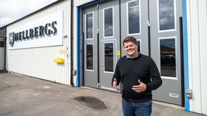 Hellbergs Security Doors owner, Sebastian Hellberg, in front of one of the new folding doors from Torverk