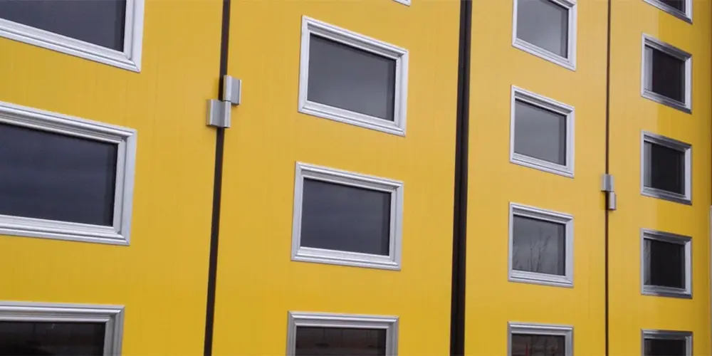 Yellow industrial door with lots of windows