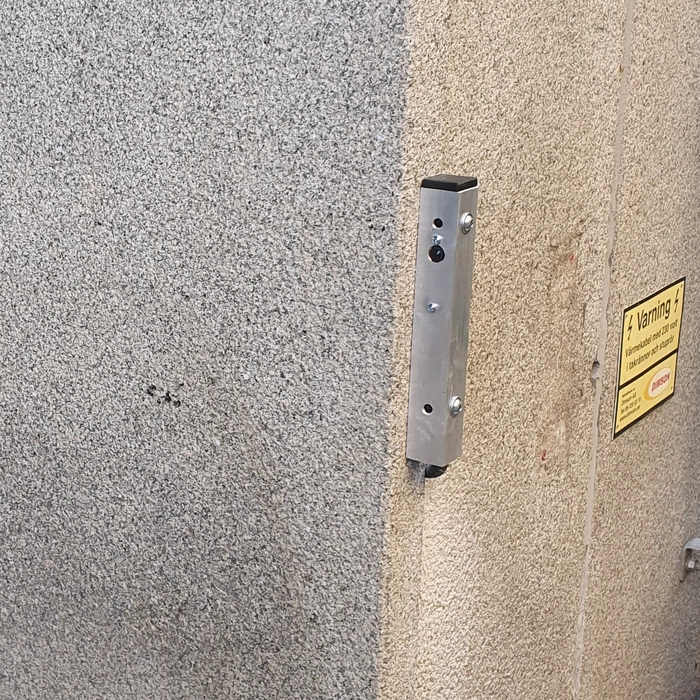 Fotocell som känner ifall något är i vägen för porten